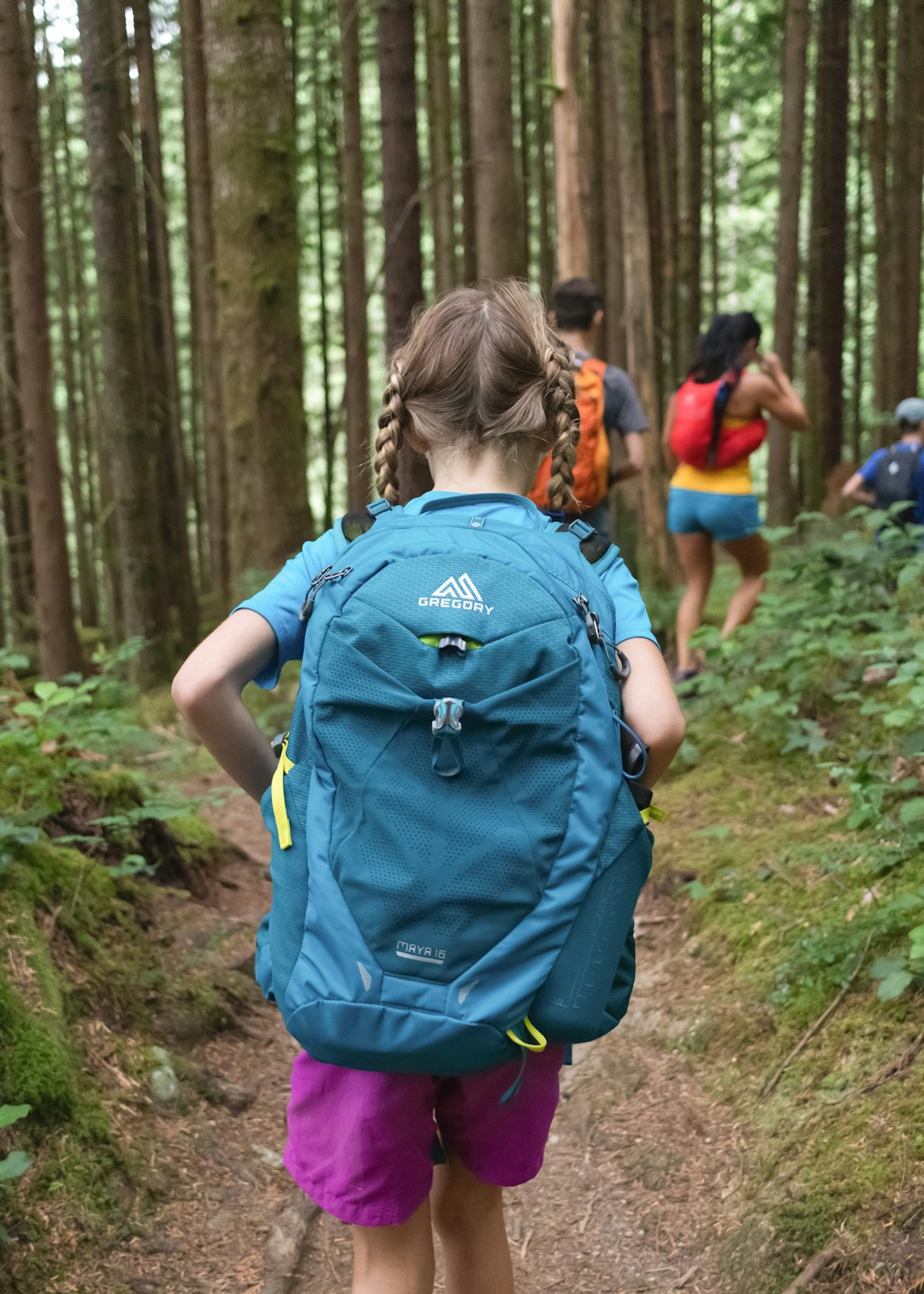 Children with hiking backpack and snacks for outdoor adventure