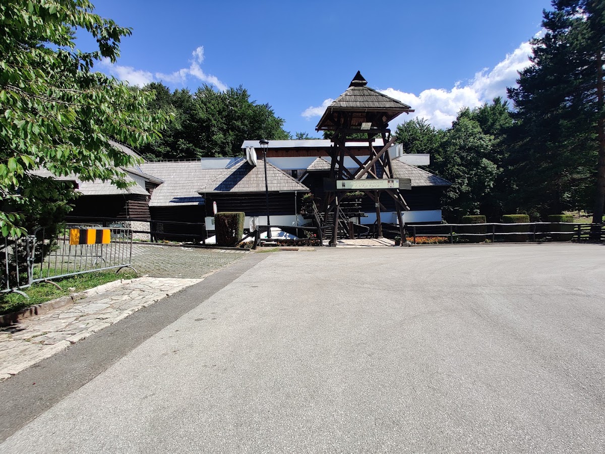 Family at national park entrance with tickets